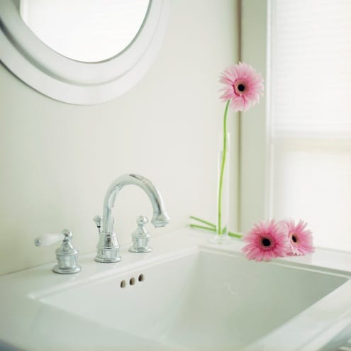 white sink with pink flowers