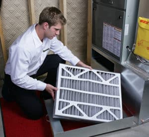 HVAC Technician with Furnace Filter 6