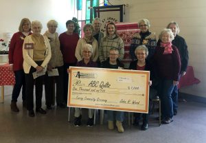 The ladies of ABC Quilts with a member of the Applewood team