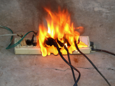 An electrical fire started from an overloaded circuit.