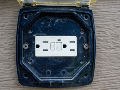 An outdoor GFCI outlet keeps you safe.
