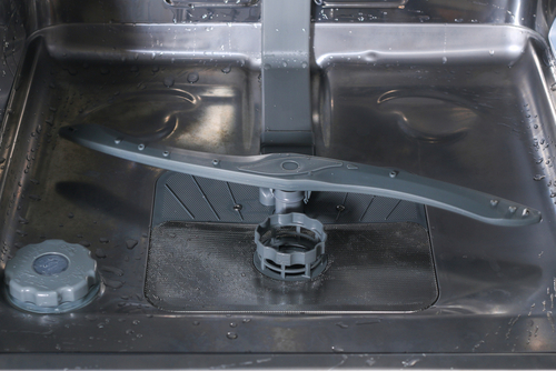 Interior view of dishwasher spray arm.