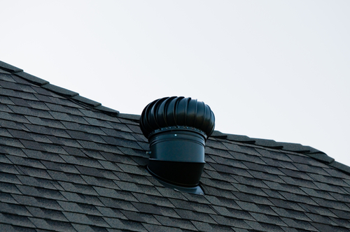 A new attic fan, installed on a Colorado roof.