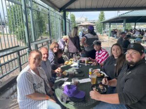 Applewood employees at a sports game.