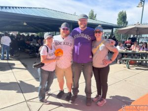 Applewood employees at a sports game.