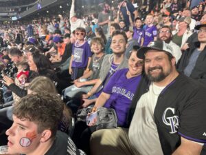 Applewood employees at a sports game.