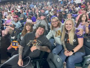 Applewood employees at a sports game.