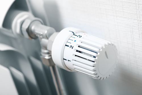 Smart control knob installed on a radiator.