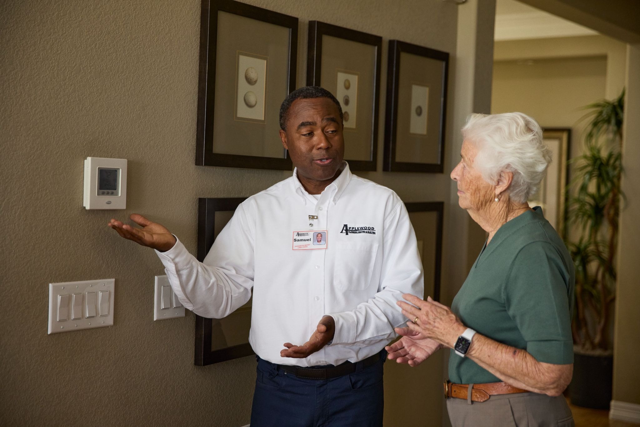 man explaining thermostat